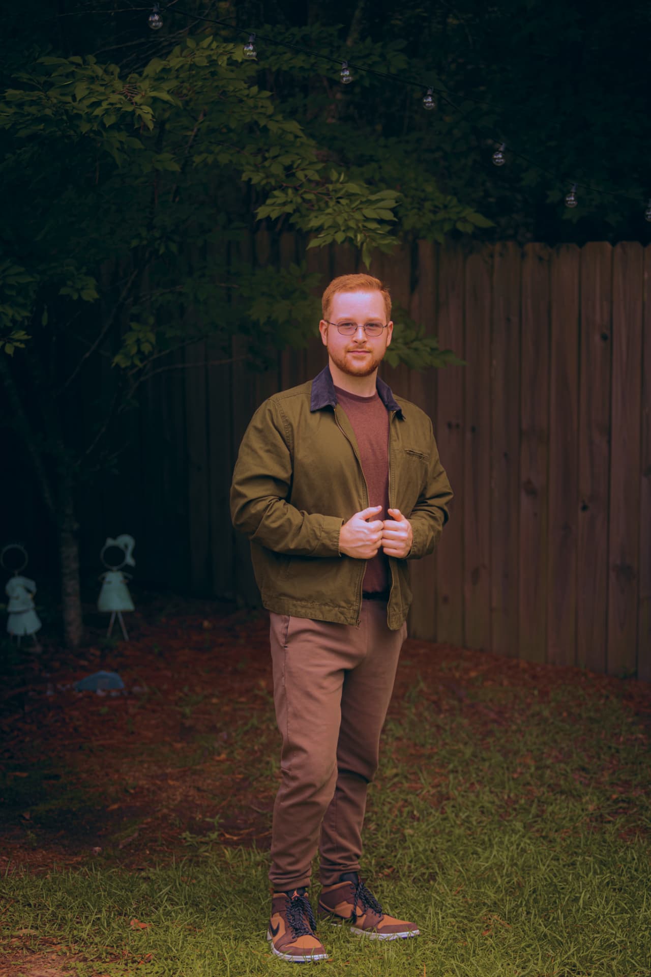 Silas Moore standing outdoors in a green jacket